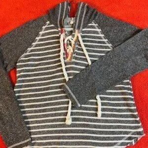 Hem and thread hooded top